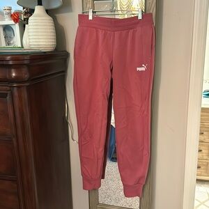 Puma women’s joggers size small. Never worn. Rose color
